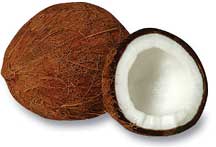 Opened coconut showing coconut meat. 